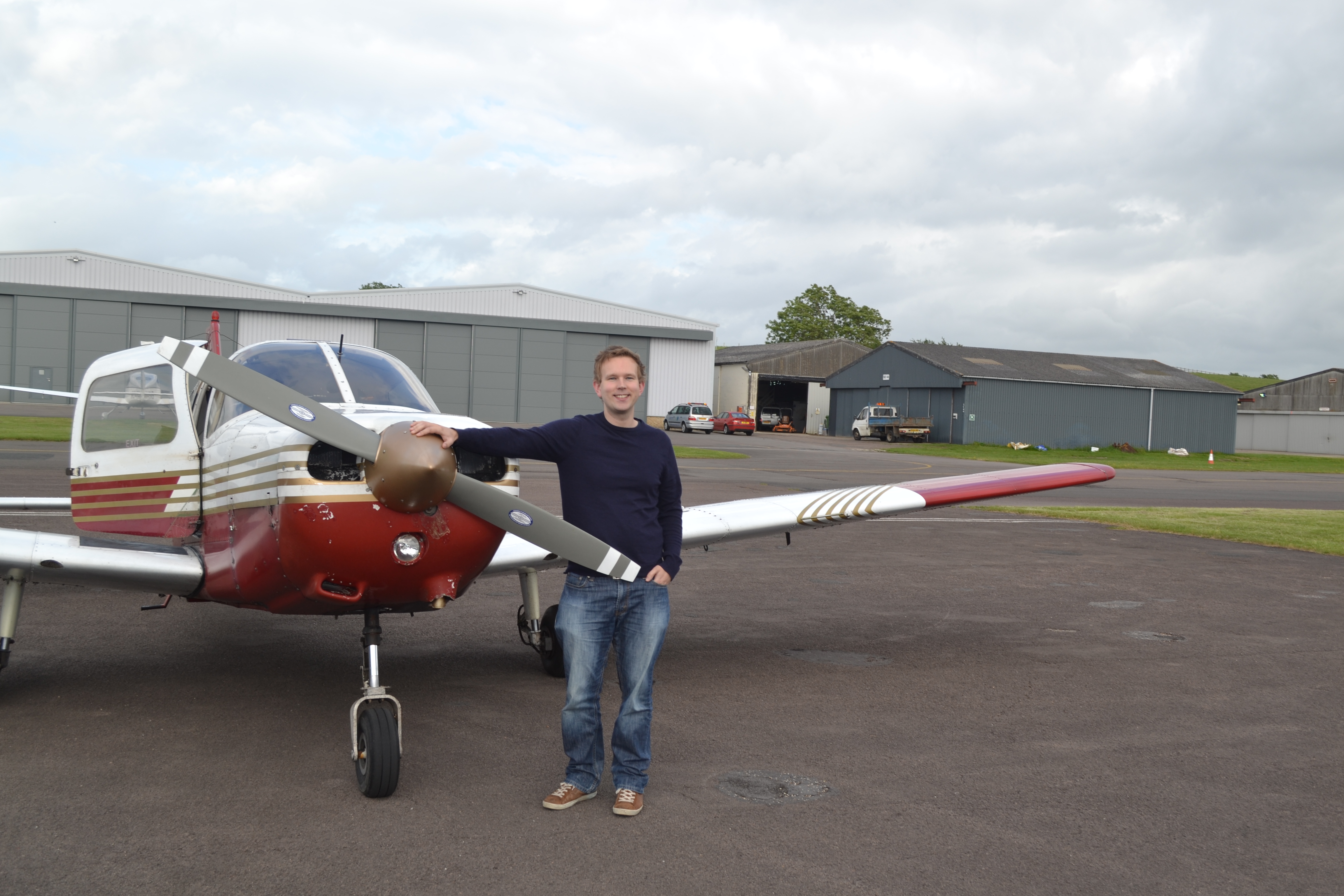 Me posing with the Piper Warrior after my first lesson